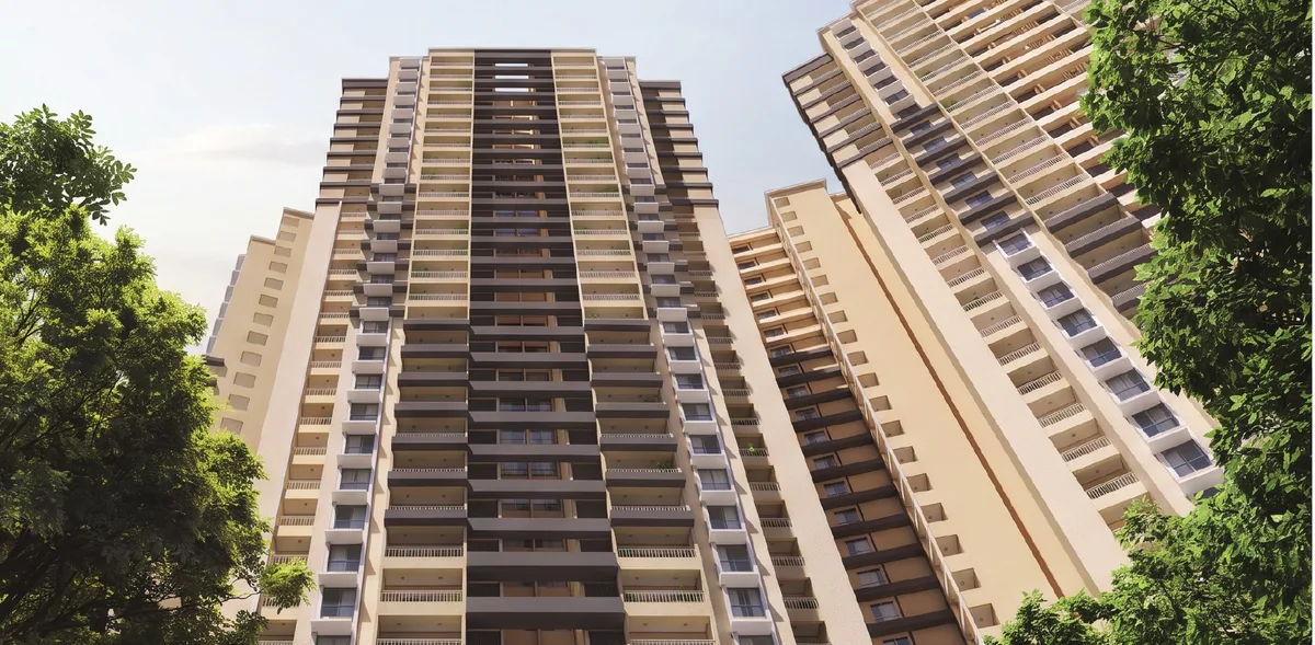 View up at the Prestige Parklane towers rising above the landscaped trees