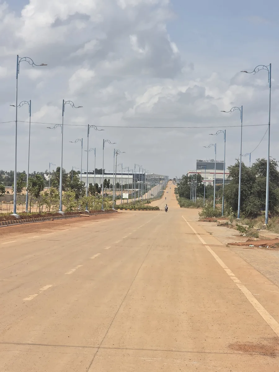 KIADB Aerospace Park Phase 2 arterial road leading to the industrial and employment hub near Prestige Park Lane, Devanahalli, August 2026