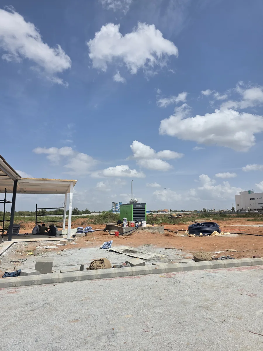 Diesel generator, water storage tanks and HDPE service ducting being installed at the Prestige Park Lane site, Devanahalli, August 2026